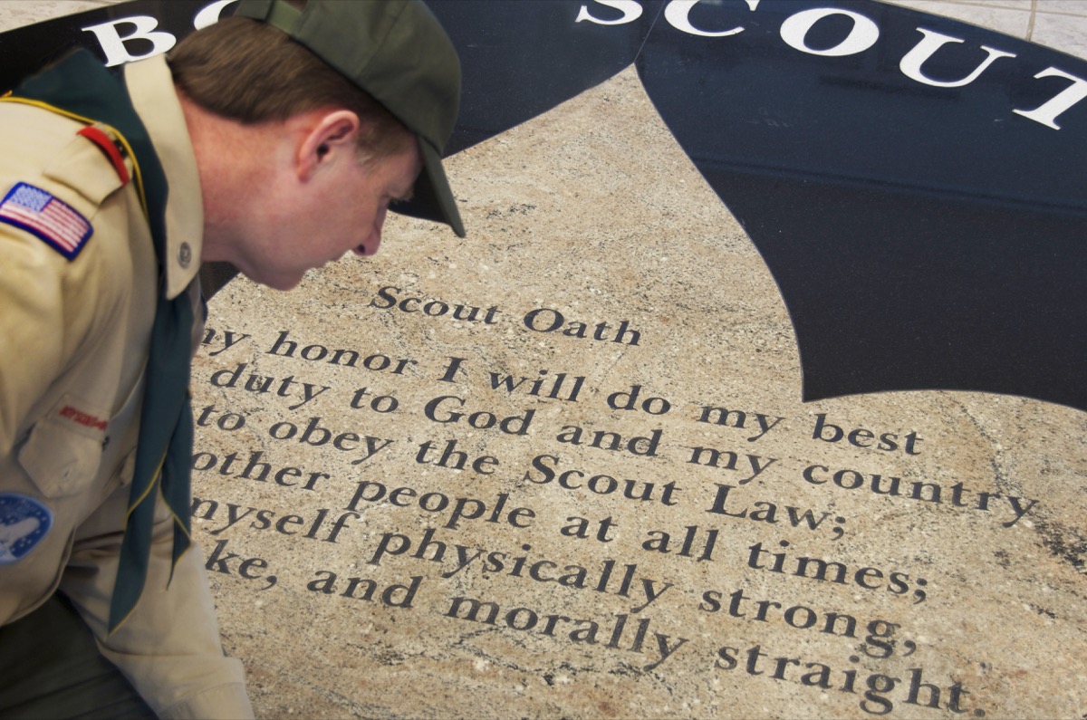 DETROIT - FEB 8,2013: Joe Parton Scoutmaster overlooks BSA Scout Oath on the floor of Dauch Scout Center in Detroit. - Image