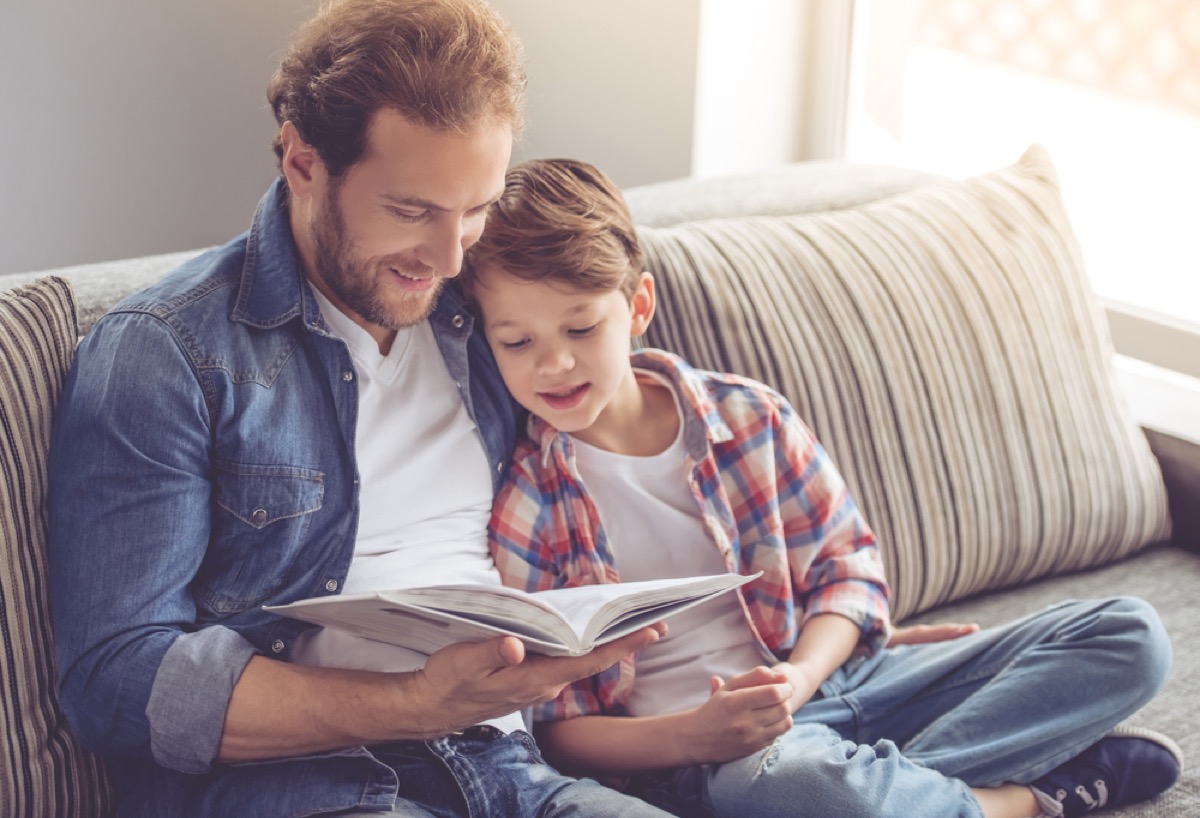 father reading to his son obsolete home items
