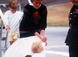 Diana and William and Harry getting off an airplane
