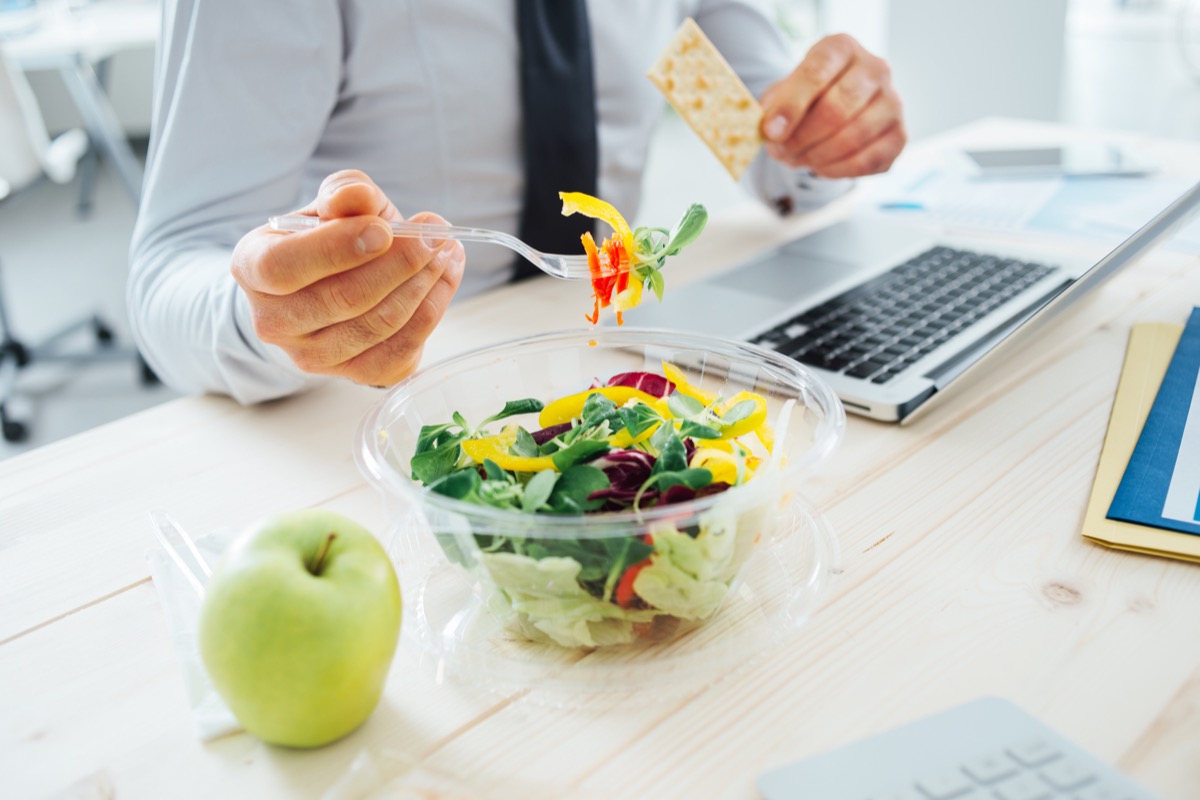 Businessman on a diet eating a salad
