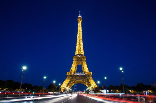 eiffel tower lit up at night