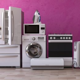 household appliances set against a purple wall