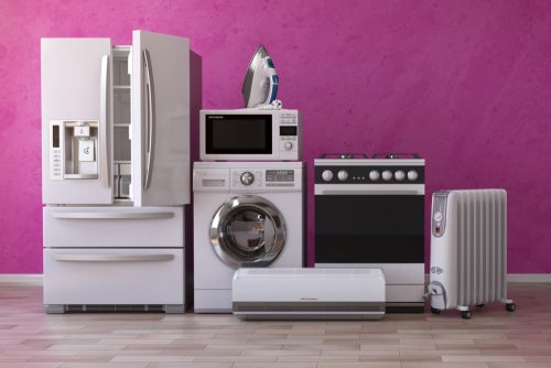 household appliances set against a purple wall