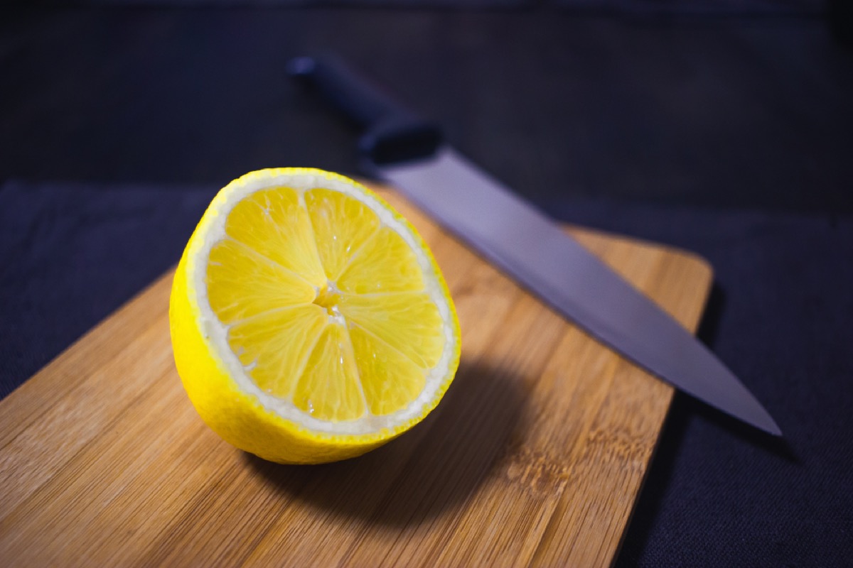 lemon on cutting board, old school cleaning tips