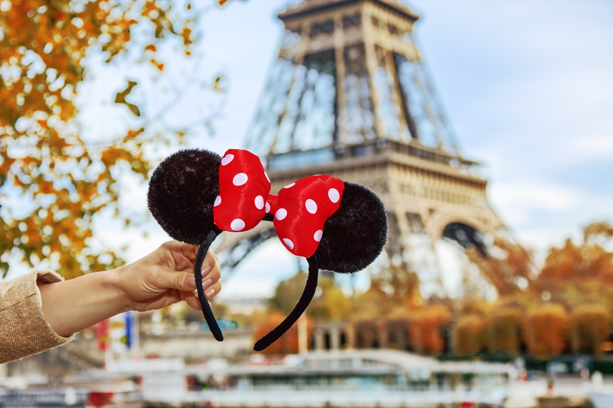 mickey mouse ears disney in front of eiffel tower paris, interesting wow facts