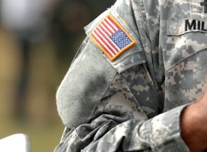 the american flag patch on a military uniform