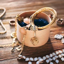 old jewelry on a wooden attic floor things to throw away