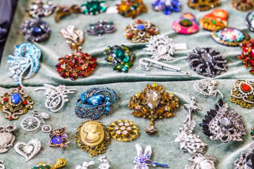 CESENA (FC), ITALY - SEPTEMBER 16, 2018: lights enlightening vintage jewellery at antiques fair in Cesena - Image