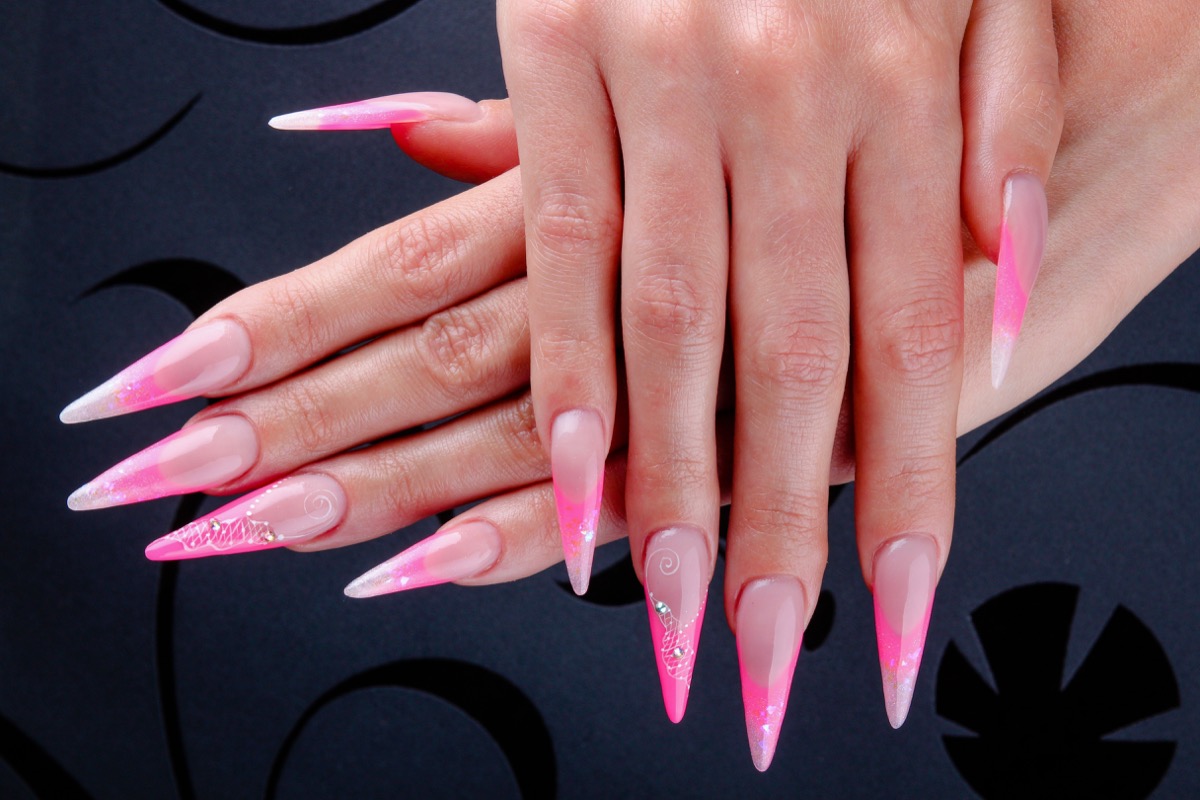 Woman with claw nails worst modern style trends