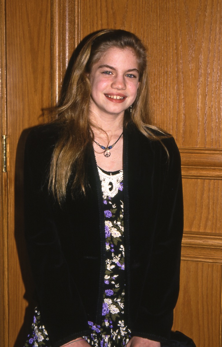 Celebrity Anna Chlumsky in peace necklace and floral dress at 1993 Youth in Film Awards
