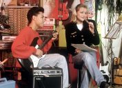 teenage couple playing a song together in the 1980s