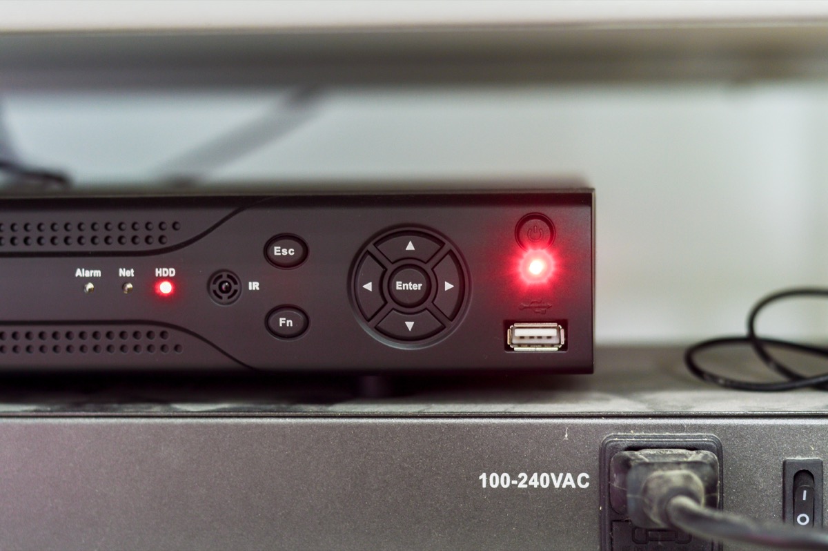 DVR box closeup, shows recording red light, life without modern techonology
