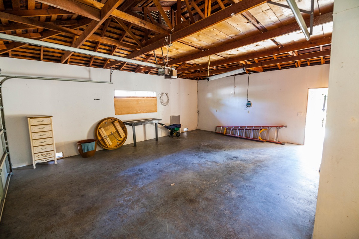 Emptied two-car garage in 1960s ranch home