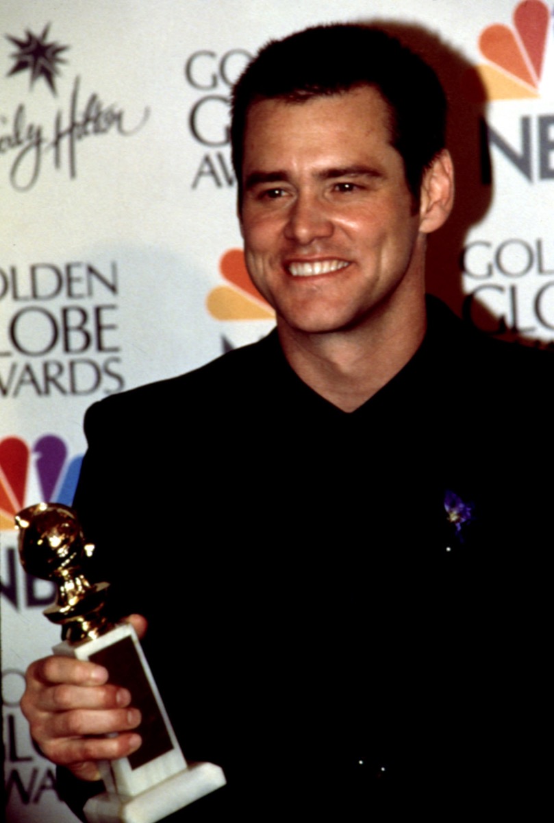Celebrity Jim Carrey Wins 1999 Golden Globe in black suit