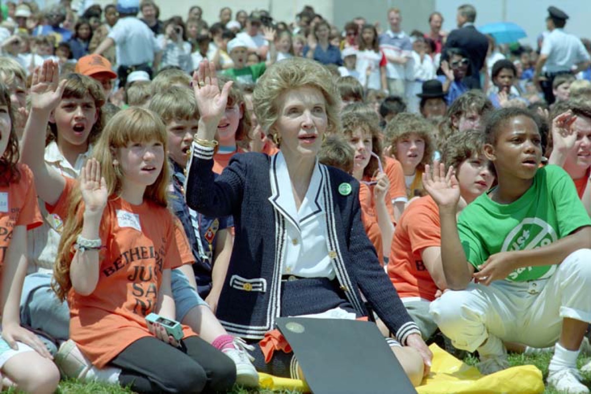 "Nancy Reagan with children taking part in a 'Just Say No' walk at the Washington Monument. 5/11/88." Photo caption is from a Nancy Reagan page on the Ronald Reagan Presidential Library website.