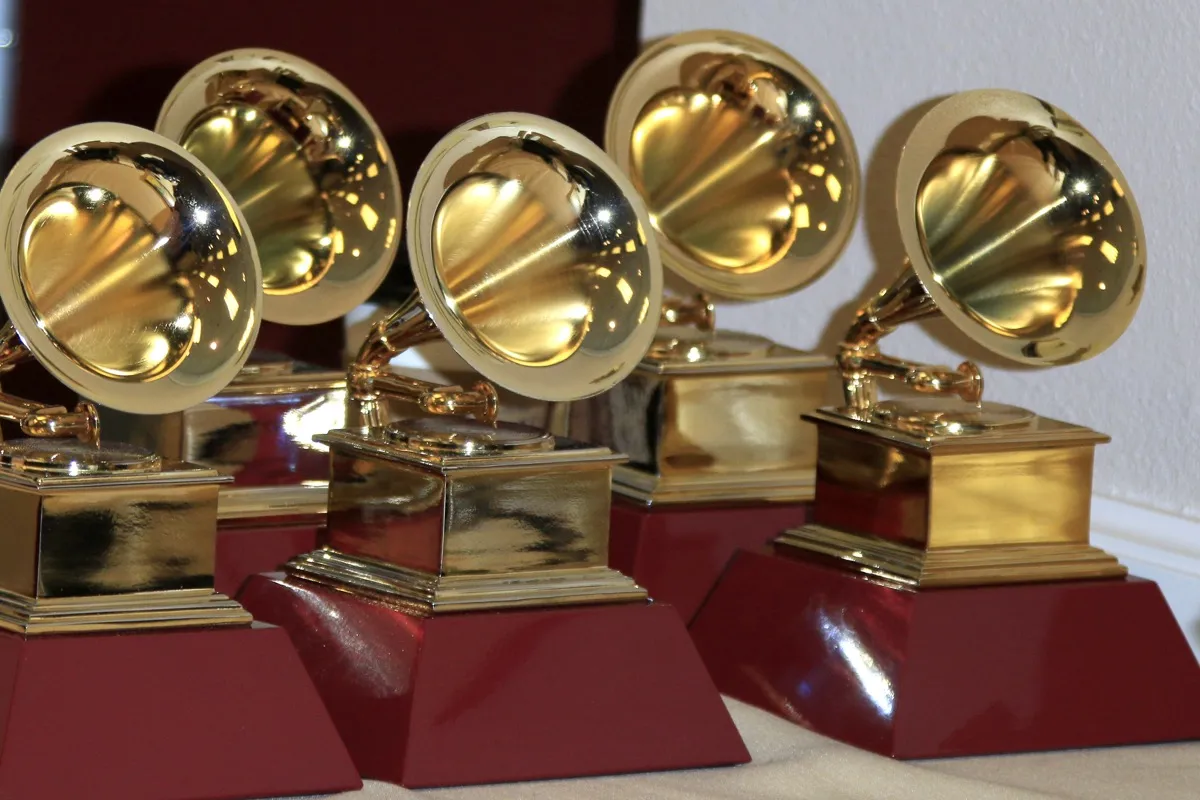 grammy award trophies lined up on table, did you know facts