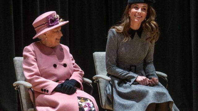 Queen Elizabeth and Kate Middleton at Kings College on stage