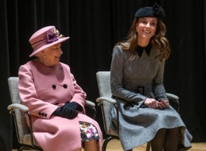 Queen Elizabeth and Kate Middleton at Kings College on stage