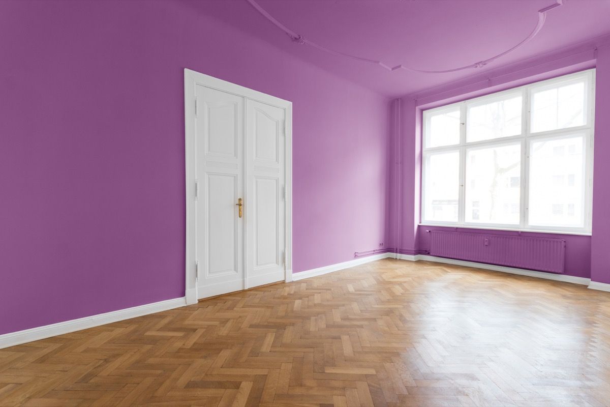 bedroom wall with purple paint all around