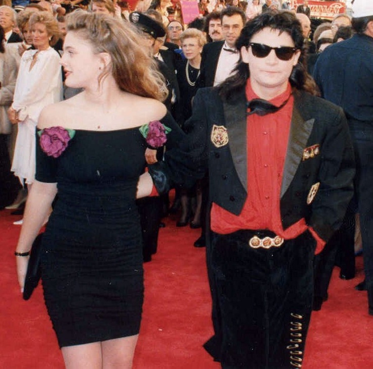 Drew Barrymore and Corey Feldman at the 61st Academy Awards, corey wearing ray ban wayfarers, 1980s fashion