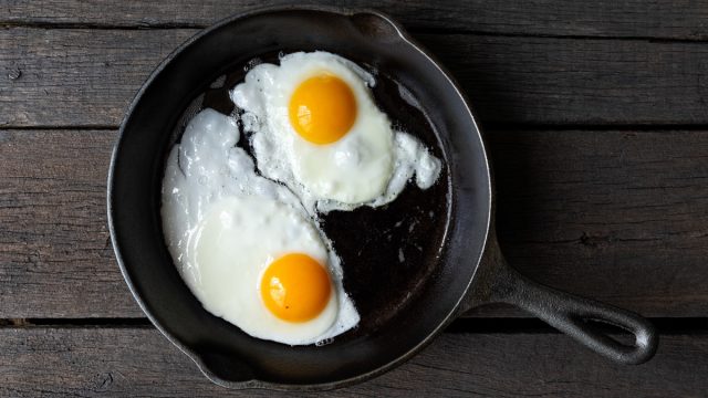two over easy eggs cracked in a frying pan, smart person habits