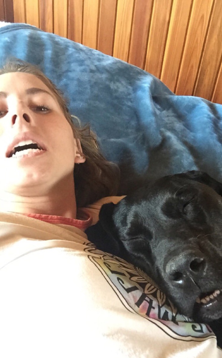 woman and dog make same facial expression dogs who look like their owners