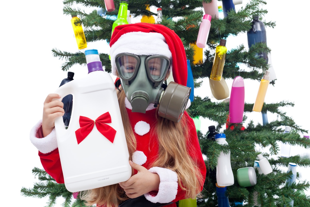 Little Girl With Plastic Items on a Christmas Tree Funny Stock Photos Weird Stock Photos