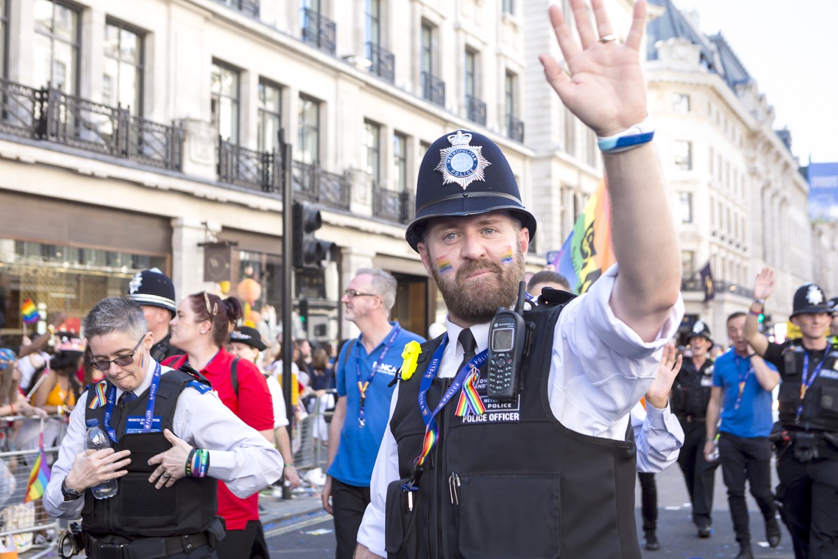 cop at lgbt pride parade in london photos from pride celebrations