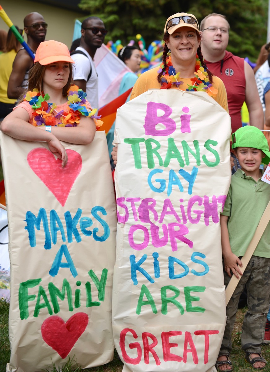 family supports lgbt rights at edmonton pride parade in canada photos from pride celebrations