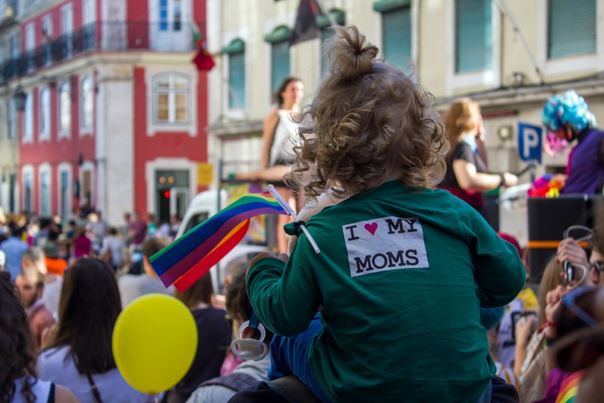 girl wearing lgbt shirt at lisbon pride in portugal photos from pride celebrations