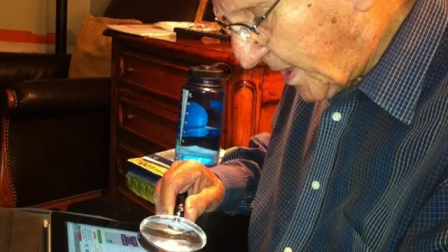 Grandpa with magnifying glass
