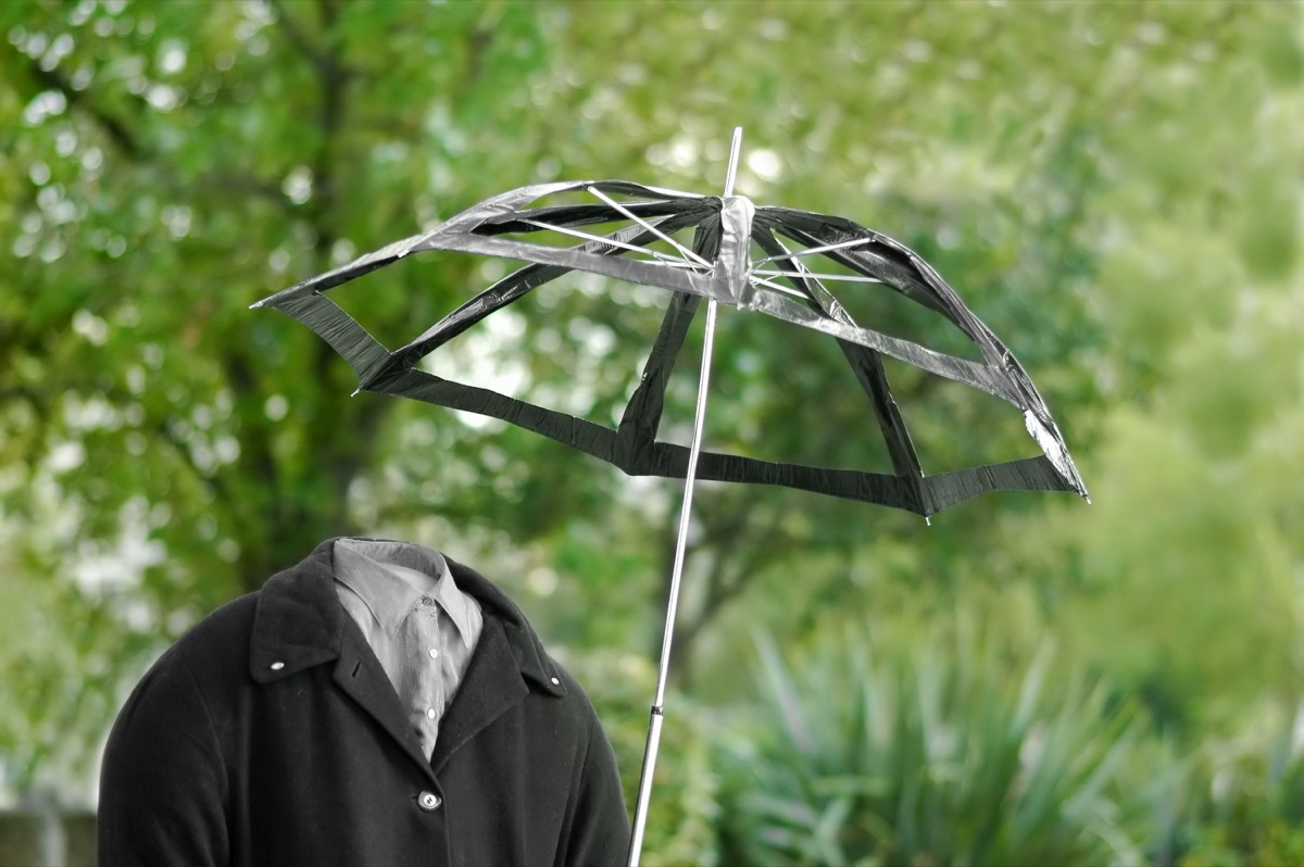 Invisible Man with a Broken Umbrella Funny Stock Photos