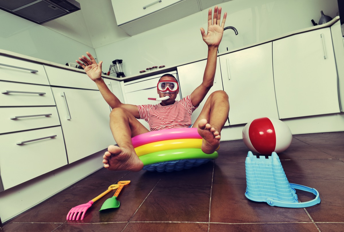 Man With Pool in His Kitchen Funny Stock Photos