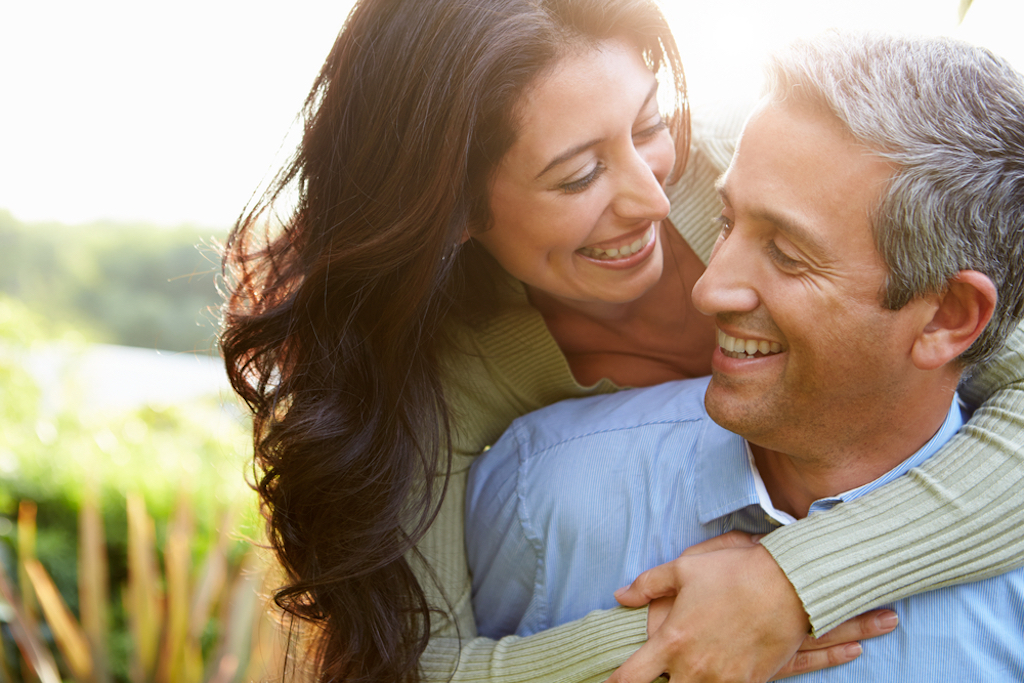 happy middle-aged couple full of optimism, long marriage tips