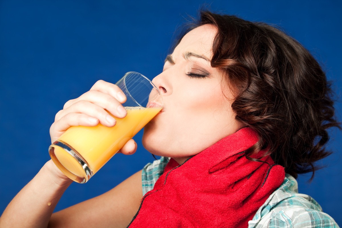 Woman Drinking Juice While Getting Strangled Funny Stock Photos