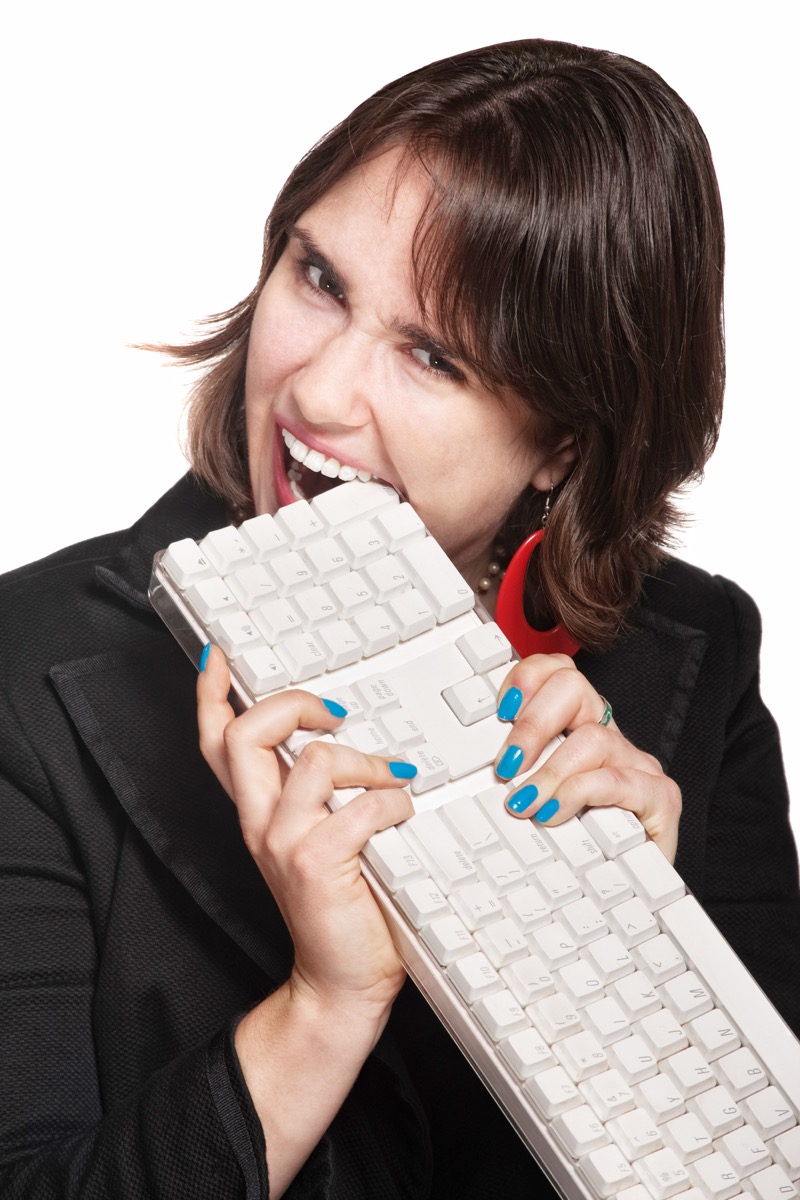 Woman Eating a Keyboard Funny Stock Photos