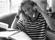 1980s photo of a woman calling someone to ask out, 1980s nostalgia