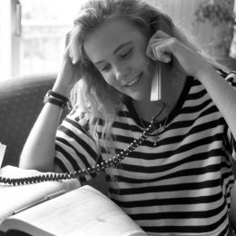 1980s photo of a woman calling someone to ask out, 1980s nostalgia