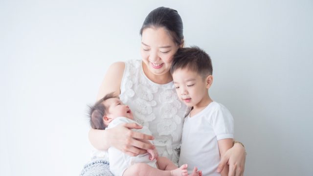 asian mom with two children
