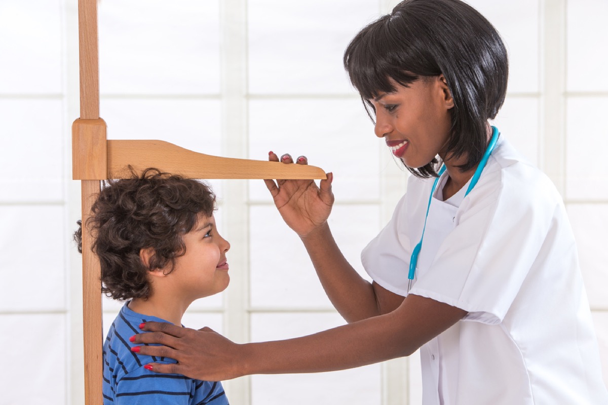 doctor measuring child's height, parenting tips