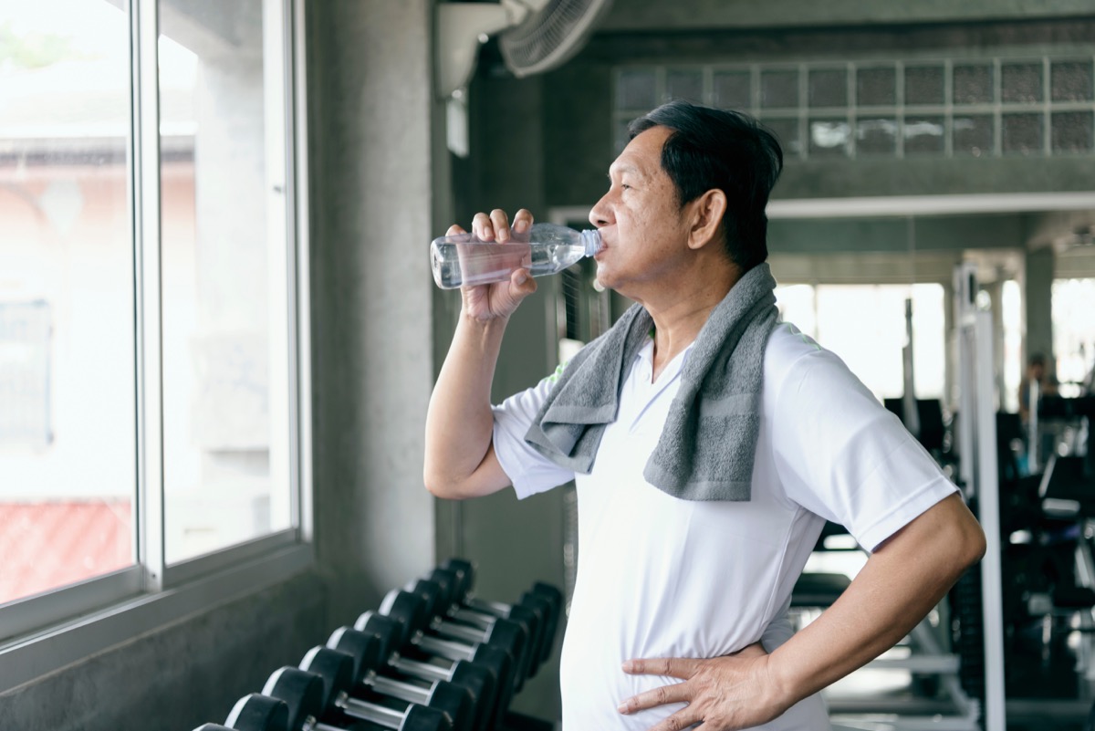 old man drinking water after exercising, ways to feel amazing