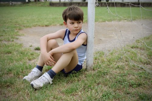 Sad Kid Playing Soccer, bad parenting