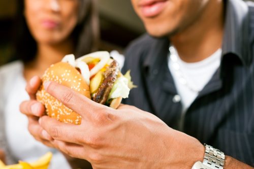 Man Eating a Hamburger, things you should never say to your spouse