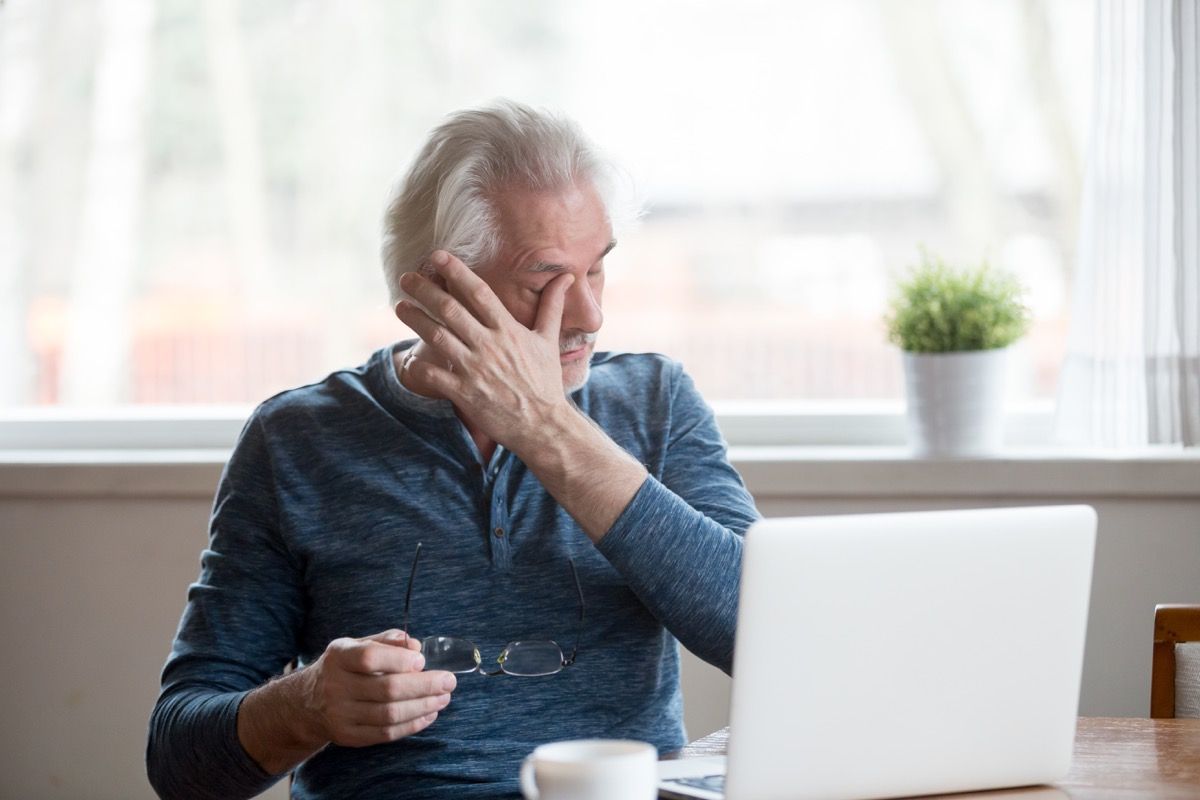 Older Man Rubbing His Dry Eyes Silent Health Symptoms