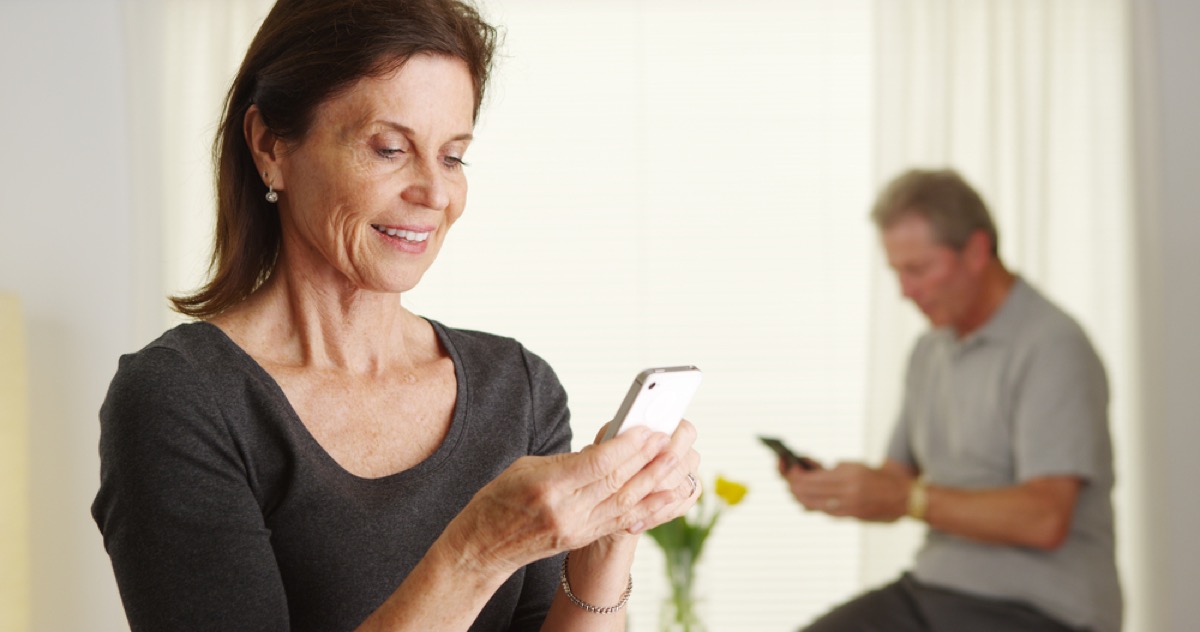 older couple on smartphones, better wife after 40