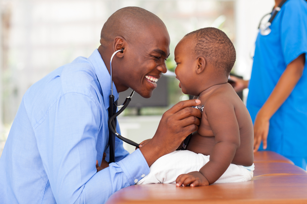 african american doctor with baby