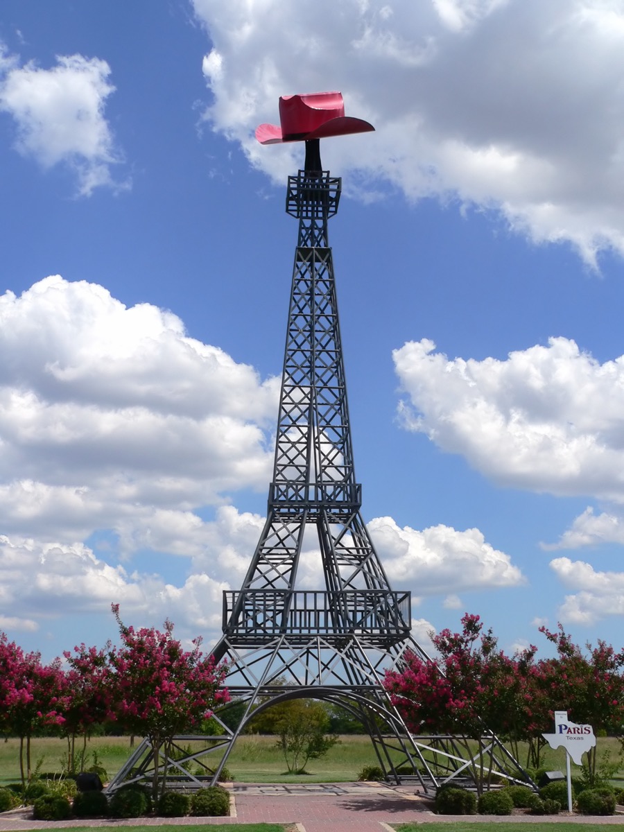 eiffel tower wearing a cowboy hat in paris texas, weird state landmarks