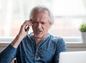 Angry elderly man on phone, things not to say to customer service