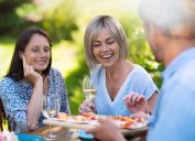 women look at food at party offered by male host, healthy sex after 40