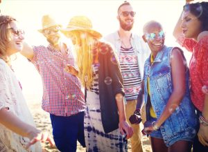 friends hanging out outside in the summer, summer party essentials